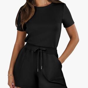 Elegant Black Short Sleeve Romper. Never worn. Perfect condition